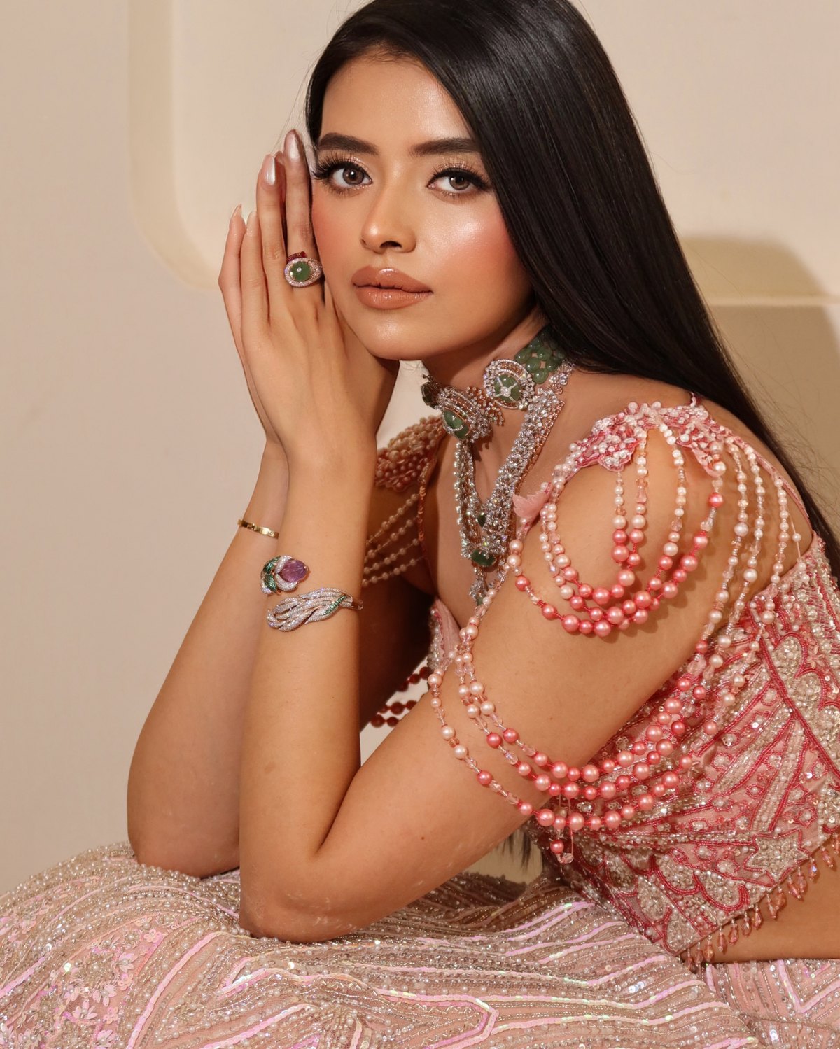 Pearl and diamond jewellery worn by a model